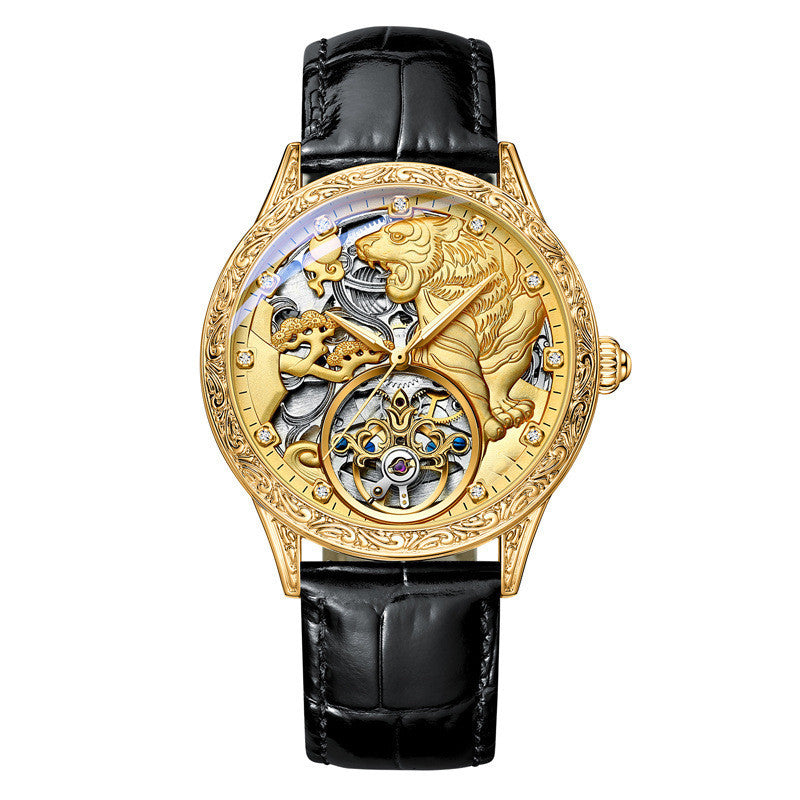 Luxury watch with gold case and black leather strap on a white background