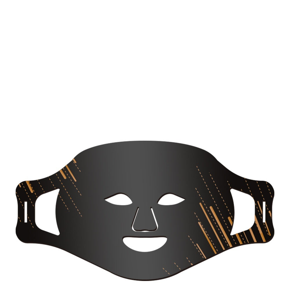 Black face mask with gold accents on a white background