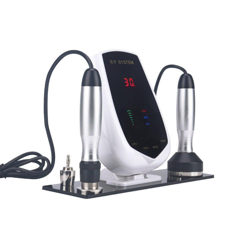 RF system device with two probes on a white background