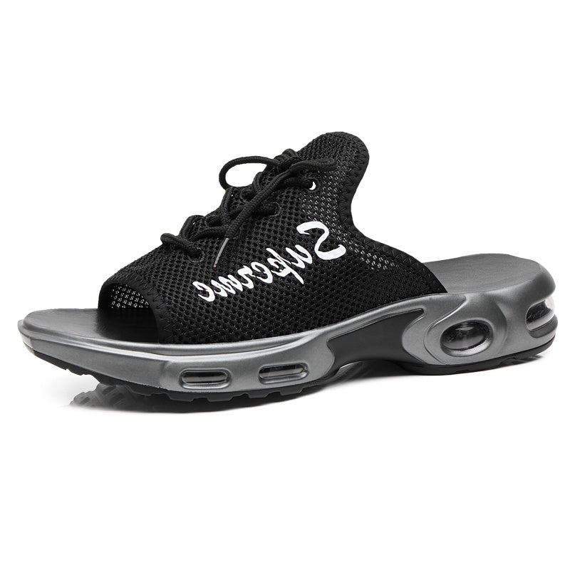 Black and gray sneaker with 'Supreme' branding on a white background