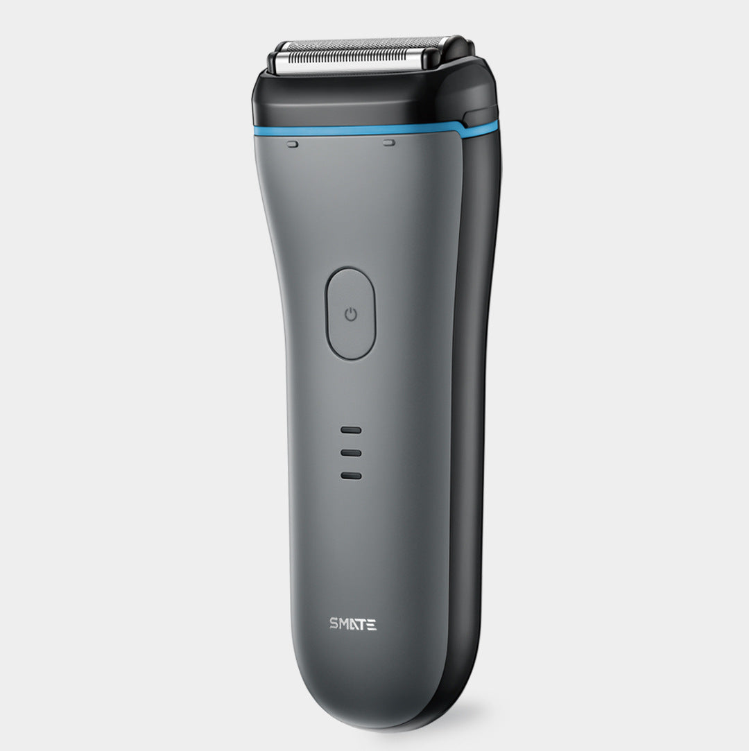 Gray electric shaver with blue accent on a light gray background