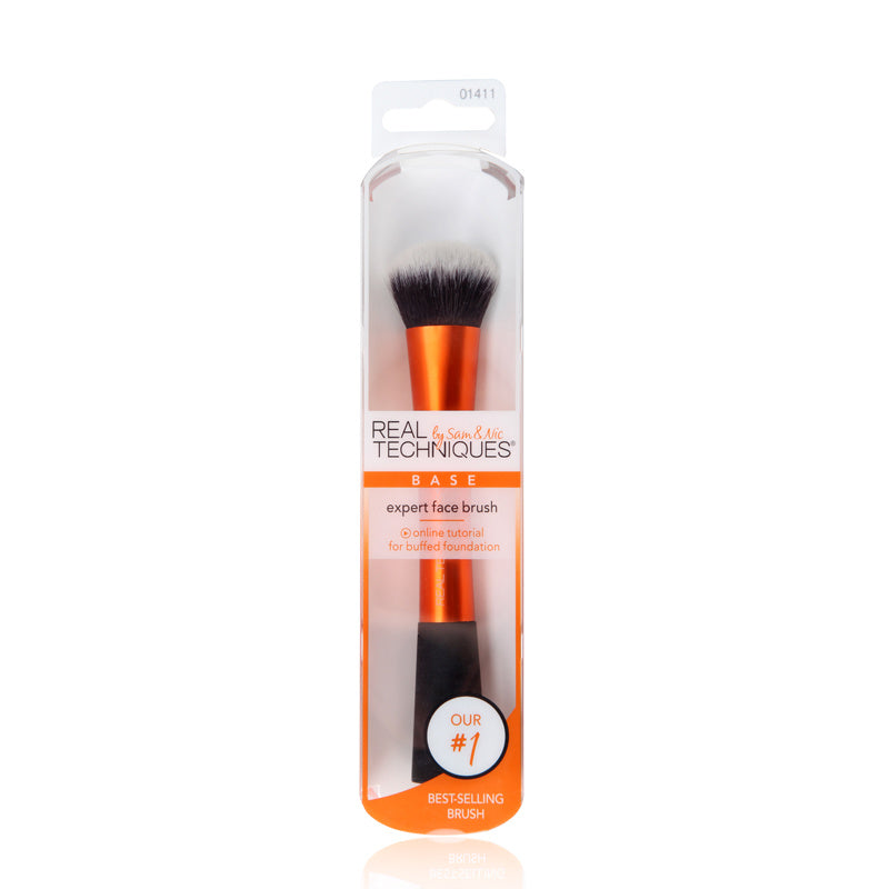 Real Techniques makeup brush in packaging on a white background