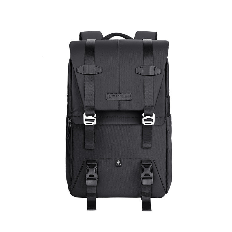 Black backpack with multiple straps on a white background