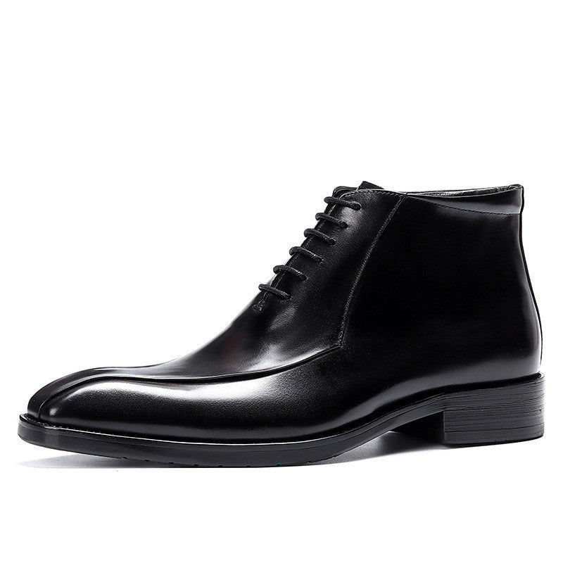 Black leather dress shoe on a white background