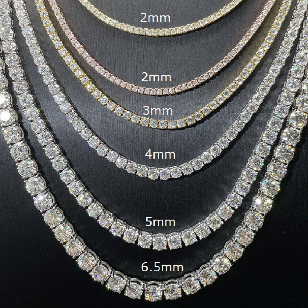 Set of diamond tennis chains with varying widths on a black background
