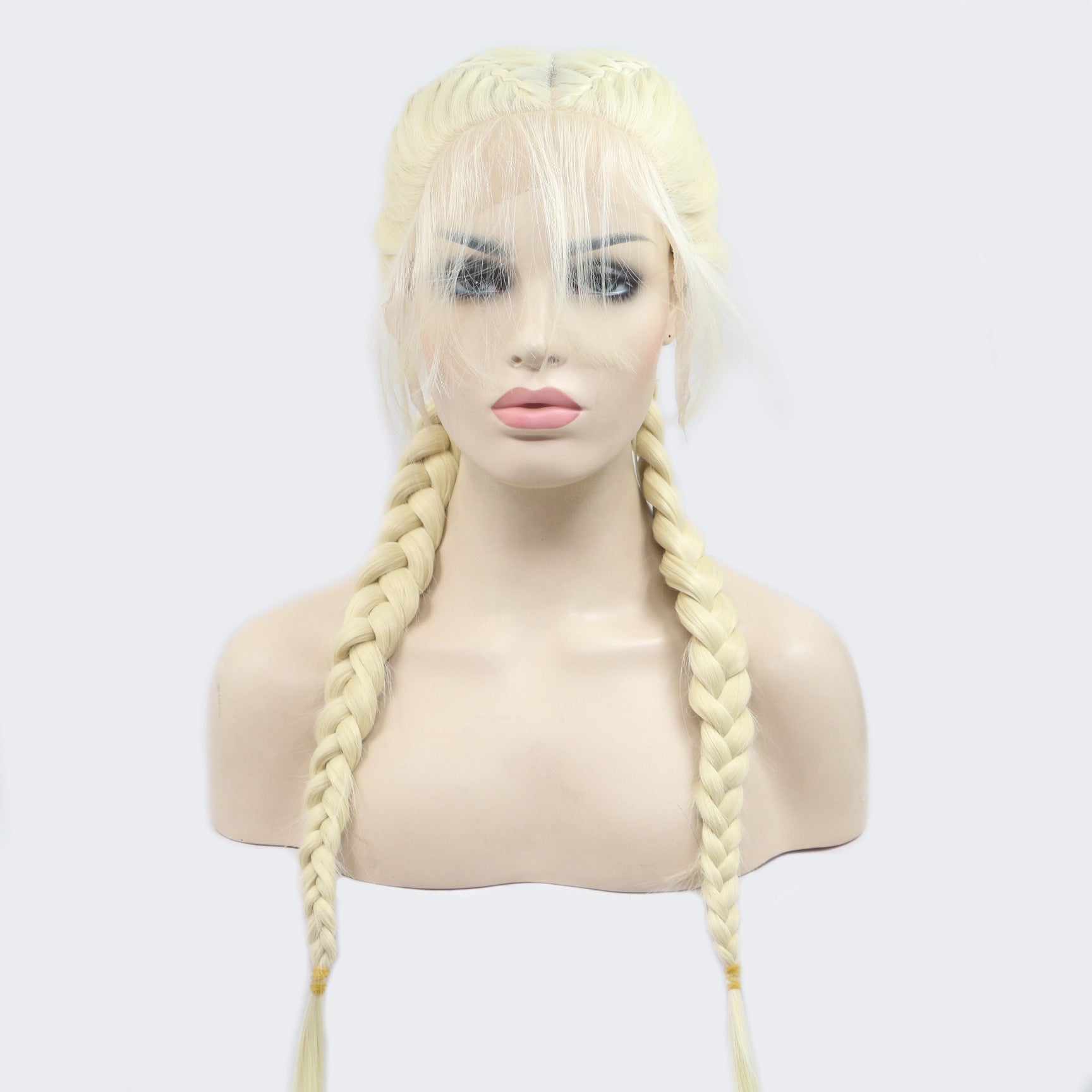 Blonde braided wig on a mannequin head against a white background