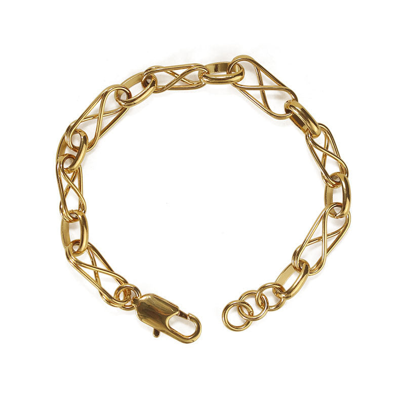 Gold chain bracelet on a white background
