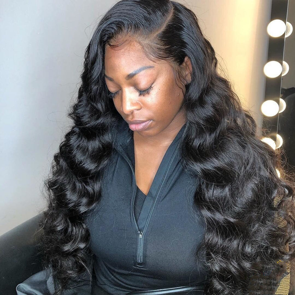 13x4 Body Wave Lace Front Wig worn by a model showing natural color and defined body wave texture.