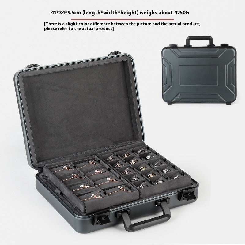 Black hard-shell carrying case with compartments on a white background