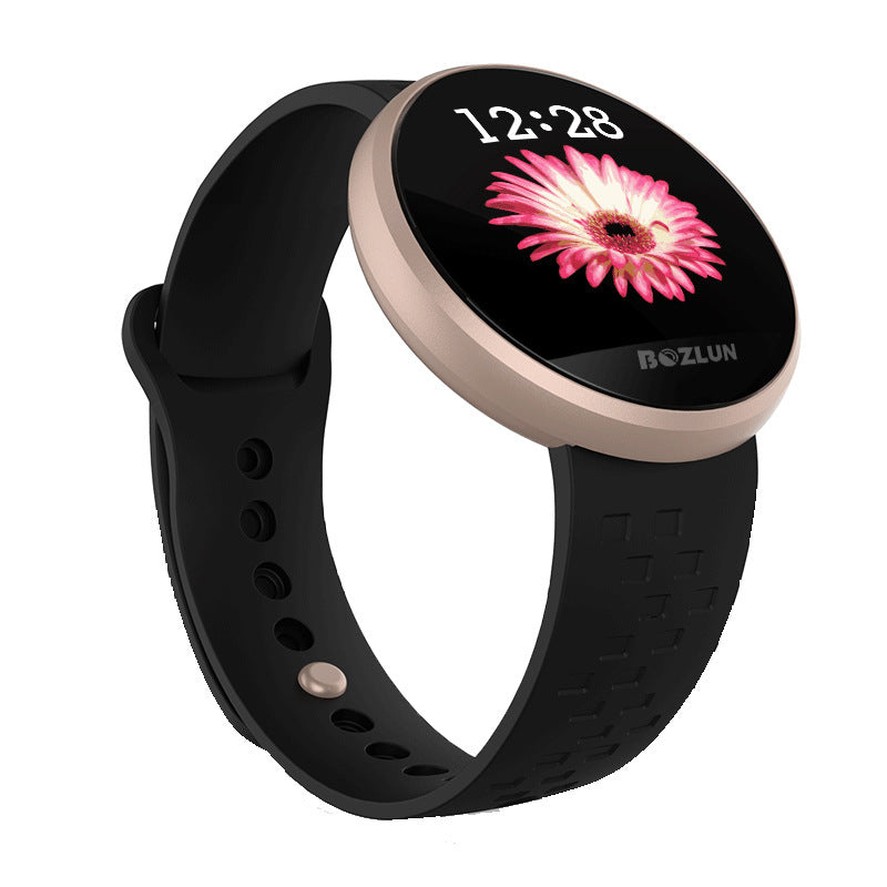 Smartwatch with black band and pink flower display on a white background