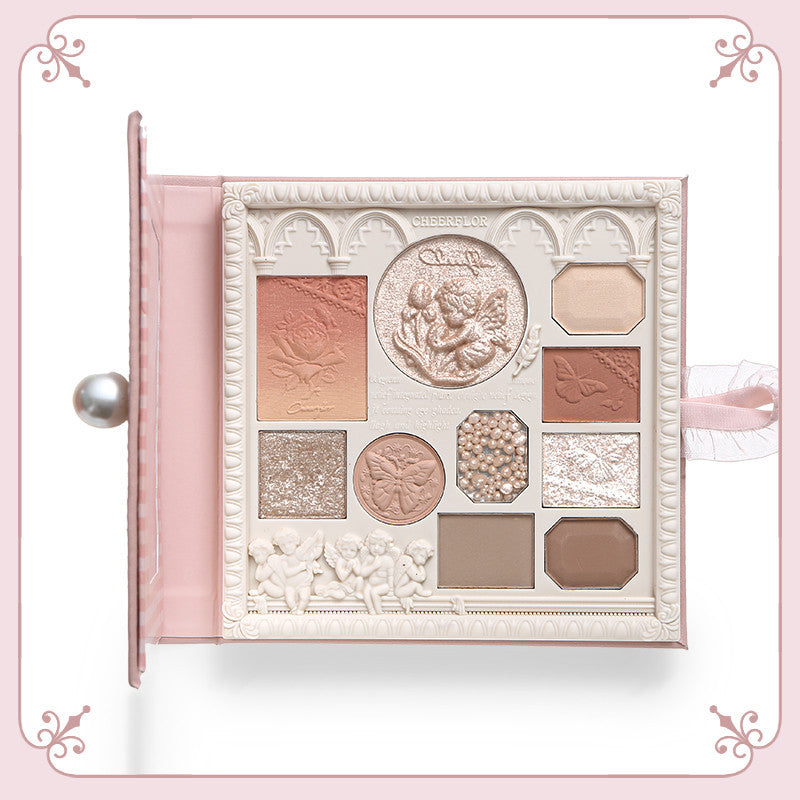 Makeup palette with decorative design on a pink background