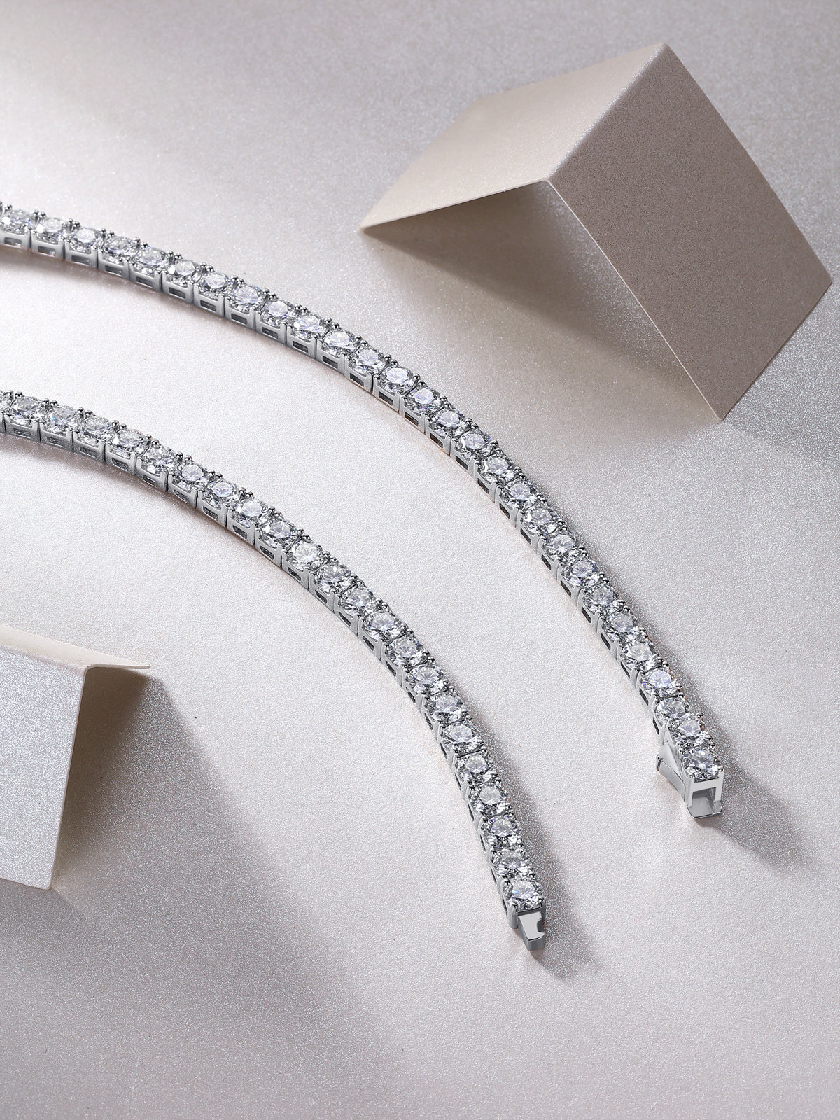 Diamond bracelet on a light gray background