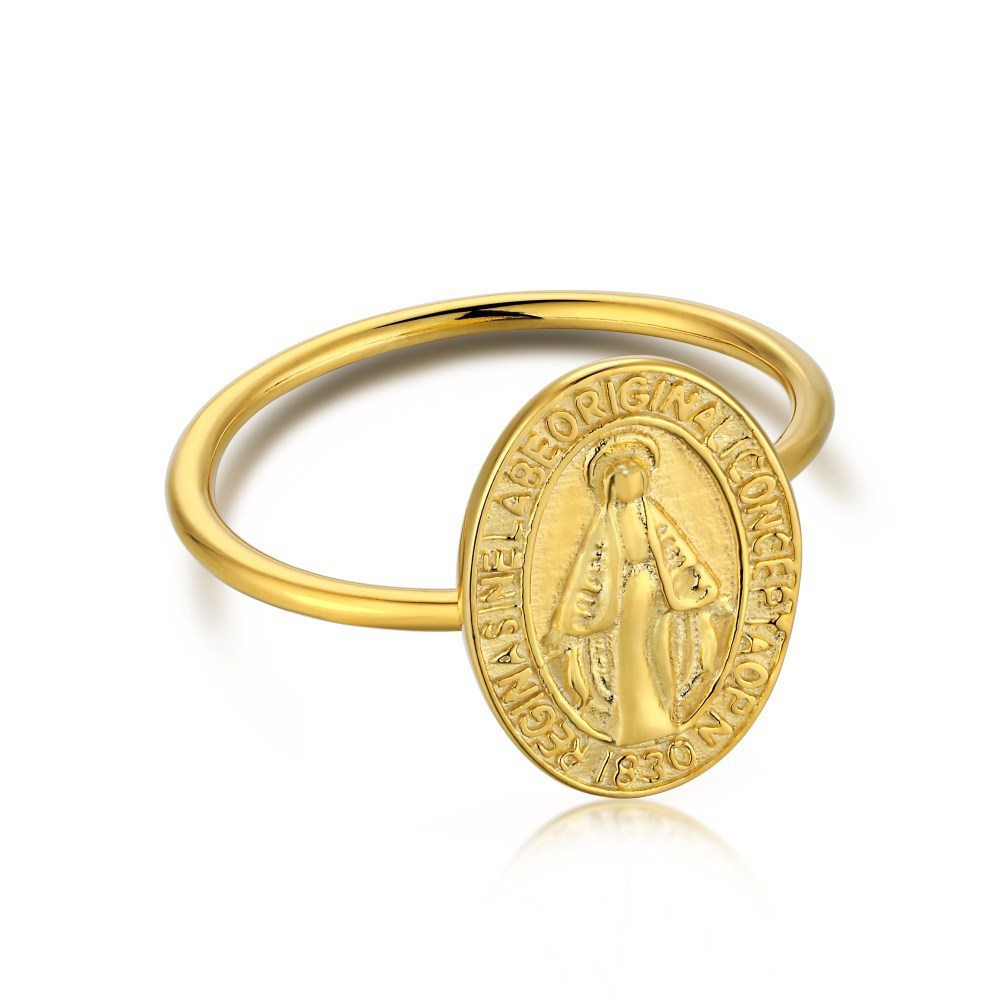 Gold ring with a religious medallion on a white background