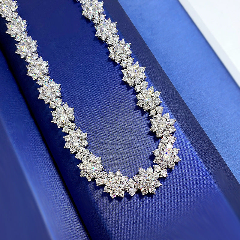 Diamond necklace on a blue fabric background
