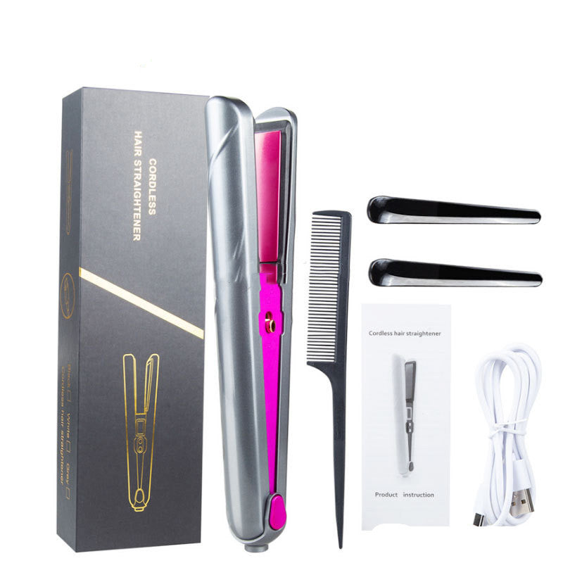 Hair straightener with packaging, comb, and cable on a white background
