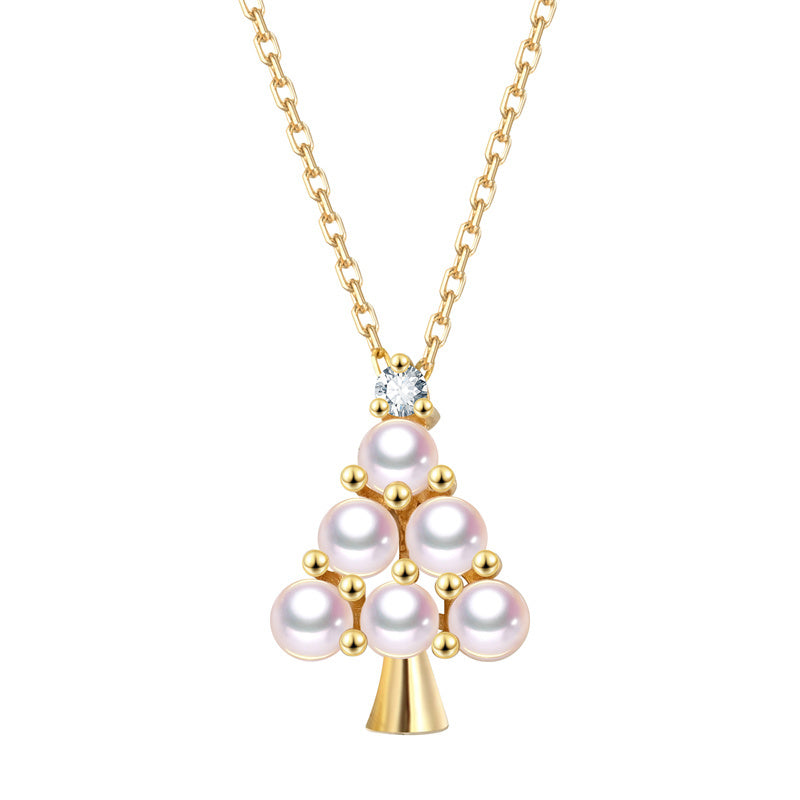Pearl necklace with gold chain on a white background