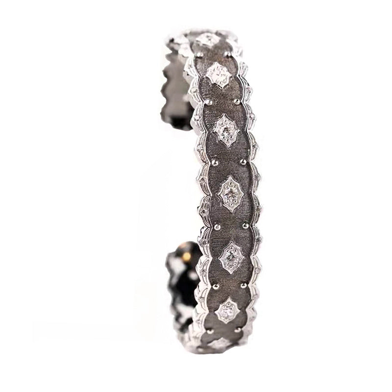 Diamond-studded ring on a white background