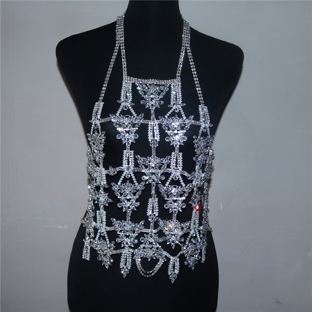 Silver beaded halter top on a mannequin against a plain background