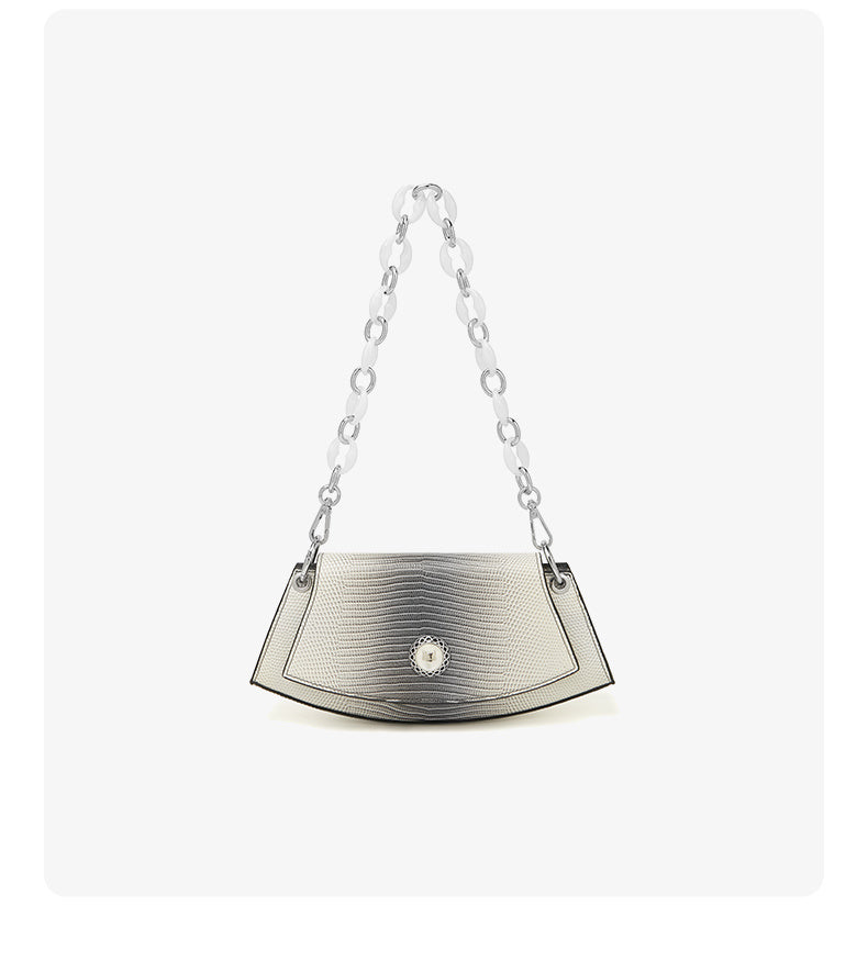 Silver handbag with chain strap on a white background
