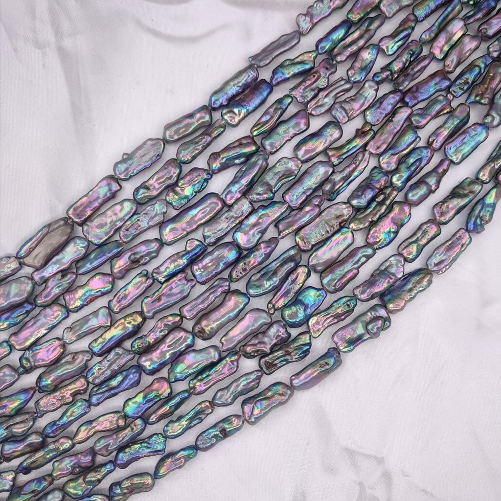 Iridescent baroque pearls on a white background