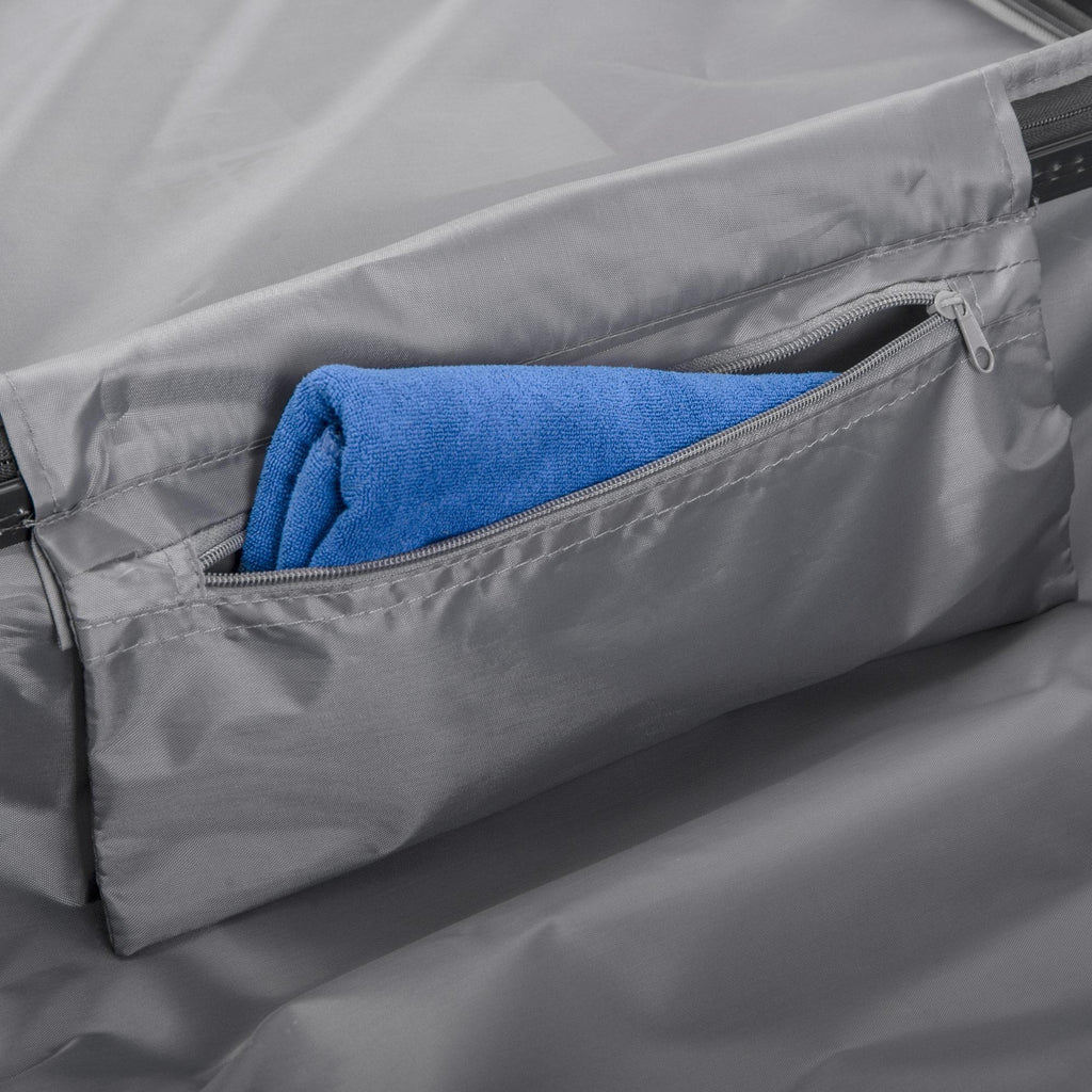 Gray car sunshade with a blue towel inside