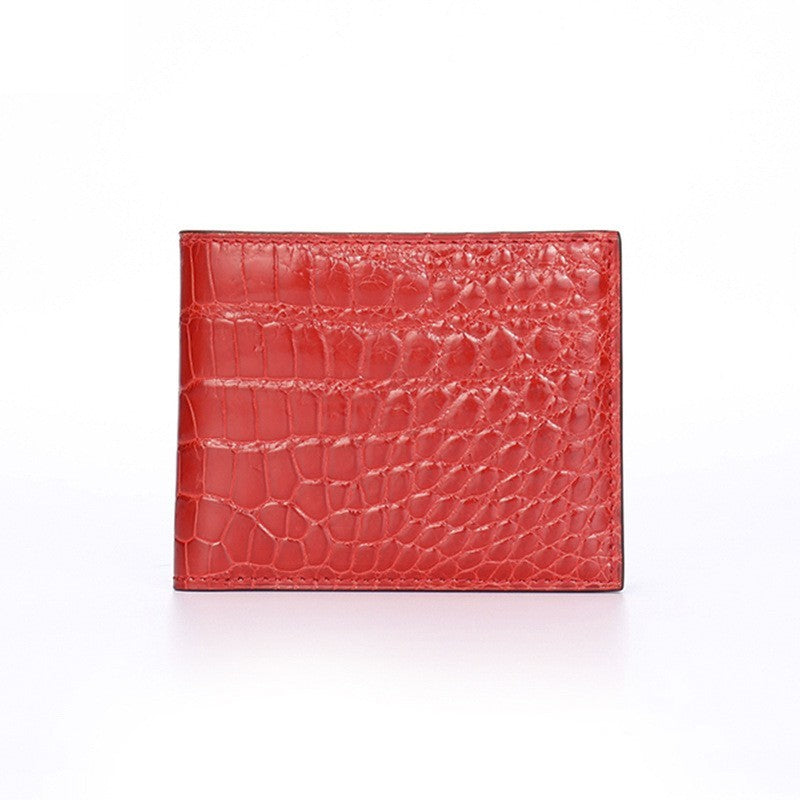 Red crocodile skin cardholder on a white background