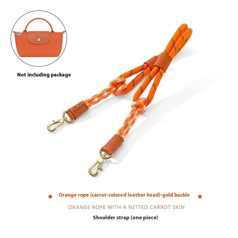 Orange shoulder strap with gold buckle on a white background