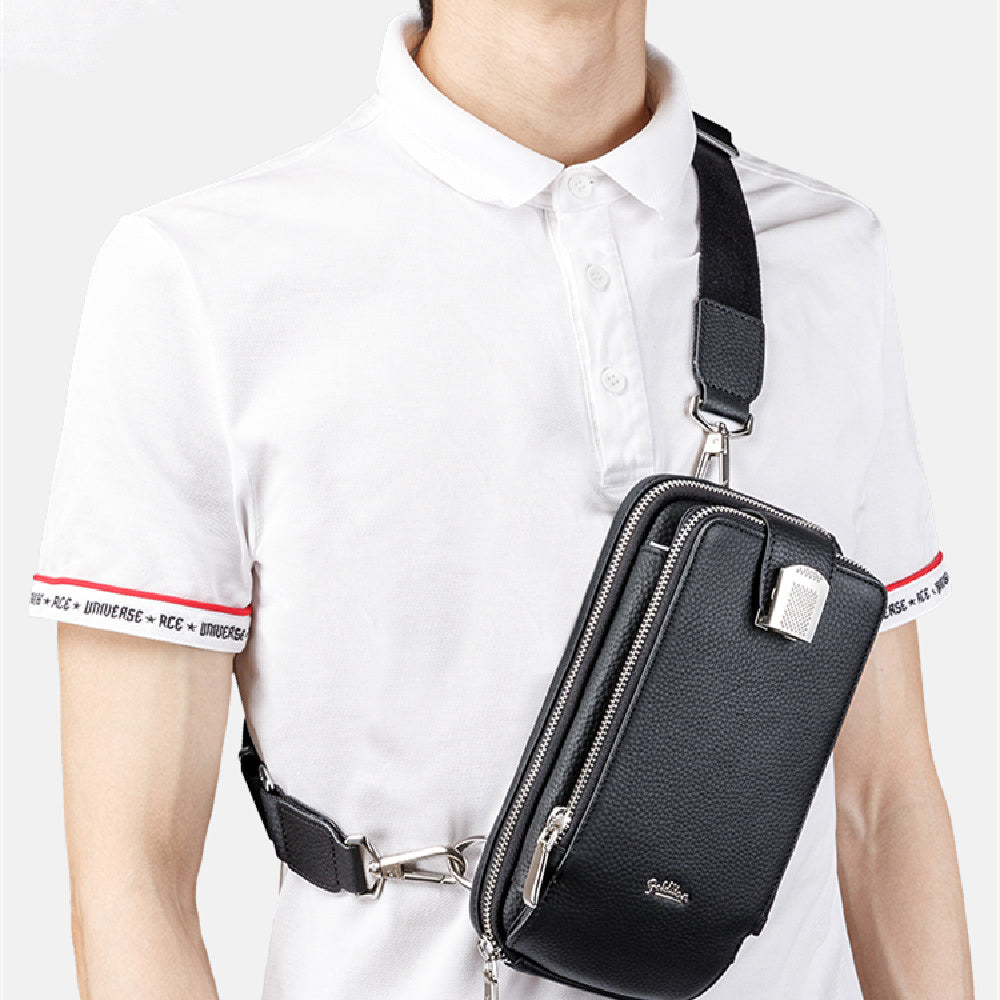 Person wearing a black crossbody bag with a white shirt