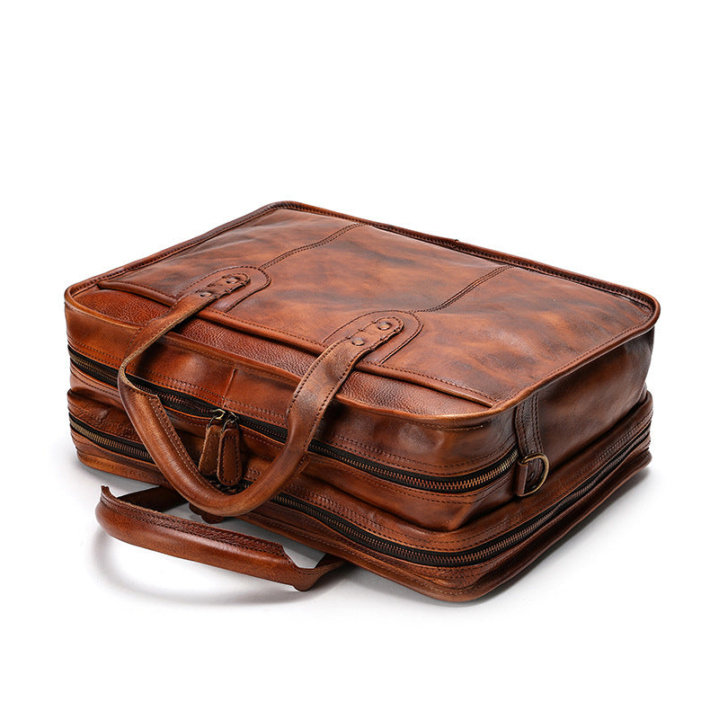 Brown leather briefcase on a white background