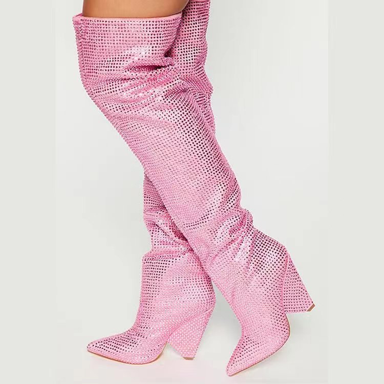 Pink fishnet knee-high boots on a light gray background