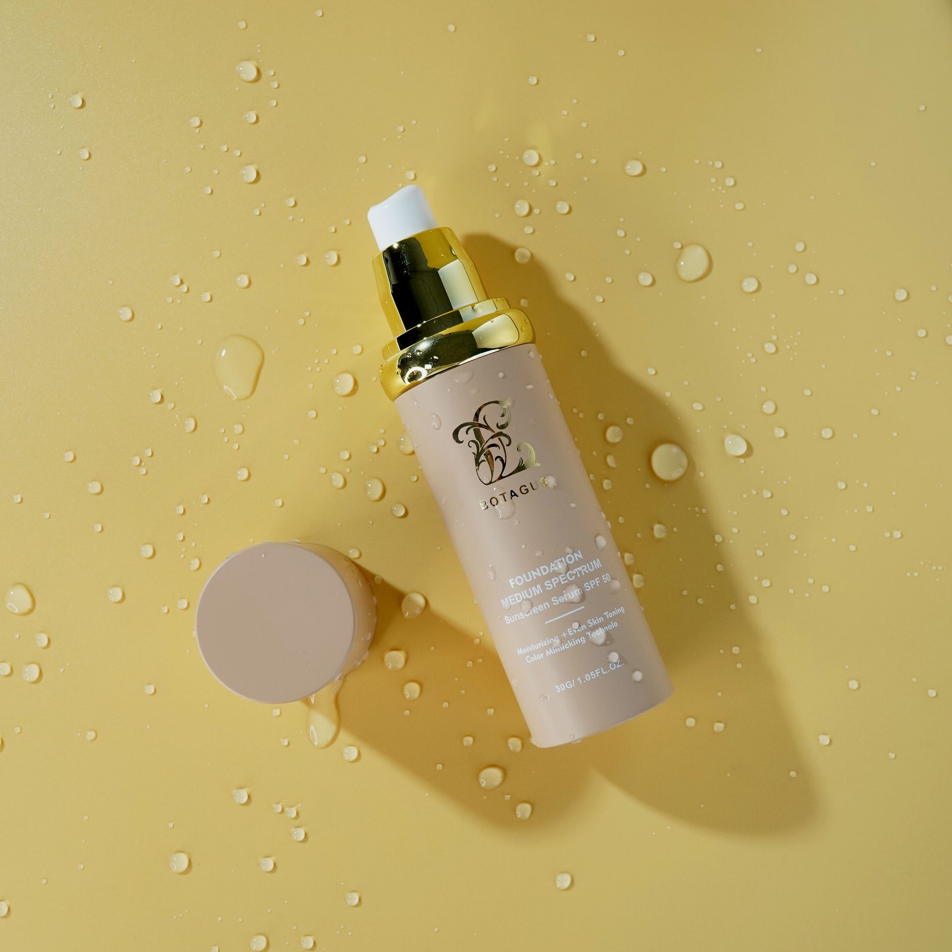 Skincare bottle with dropper on a yellow background