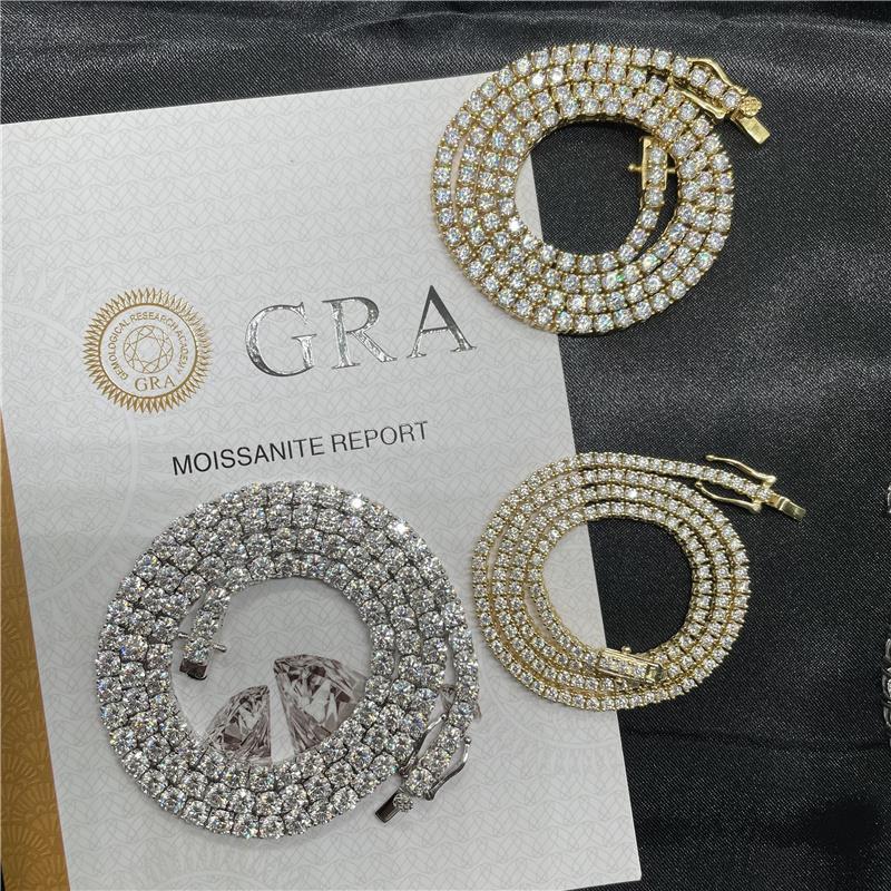 Gold and silver hoop earrings on a card with 'GRA' branding