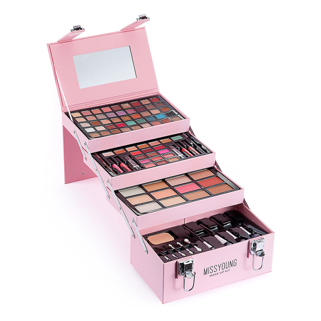 Pink makeup set with multiple palettes and tools on a white background