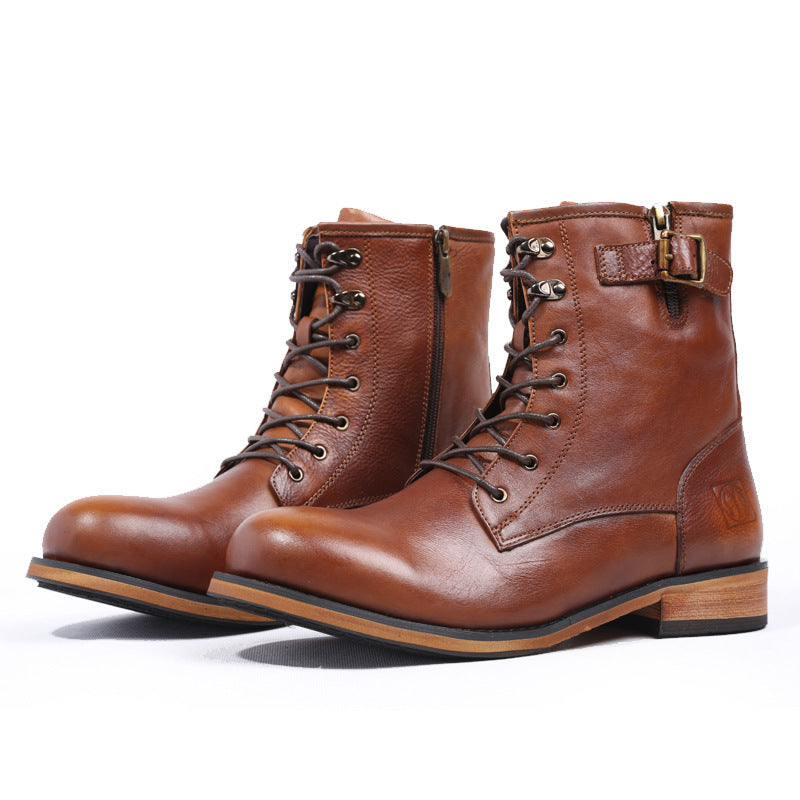 Pair of brown leather boots with laces and a buckle on a white background