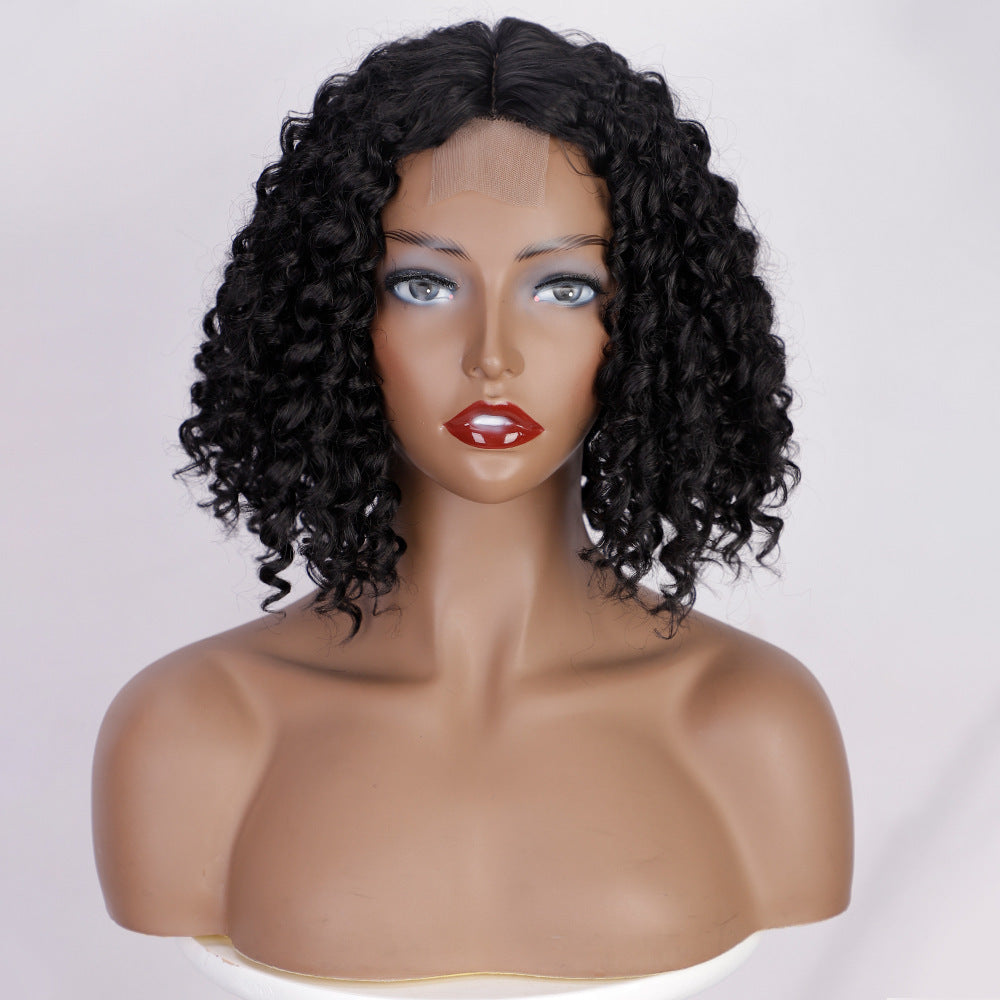 Mannequin head with a black curly wig on a white background