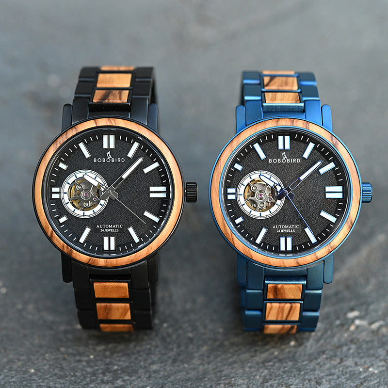 Two watches with wooden straps on a gray background