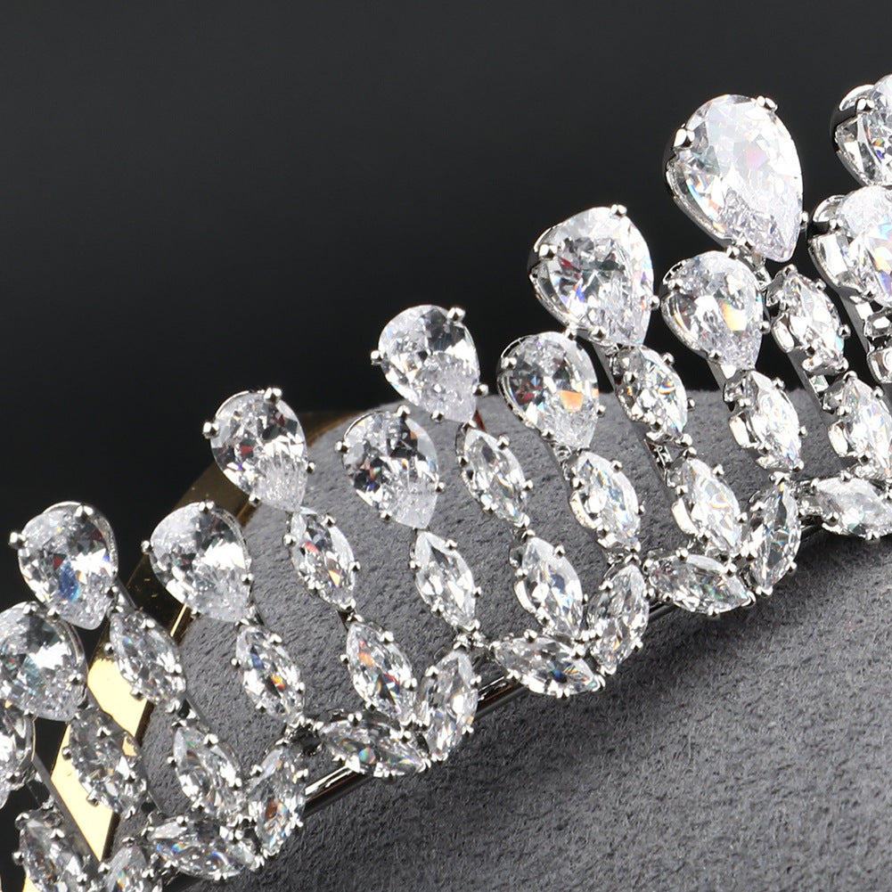 Close-up of a decorative hair accessory with crystals on a dark background