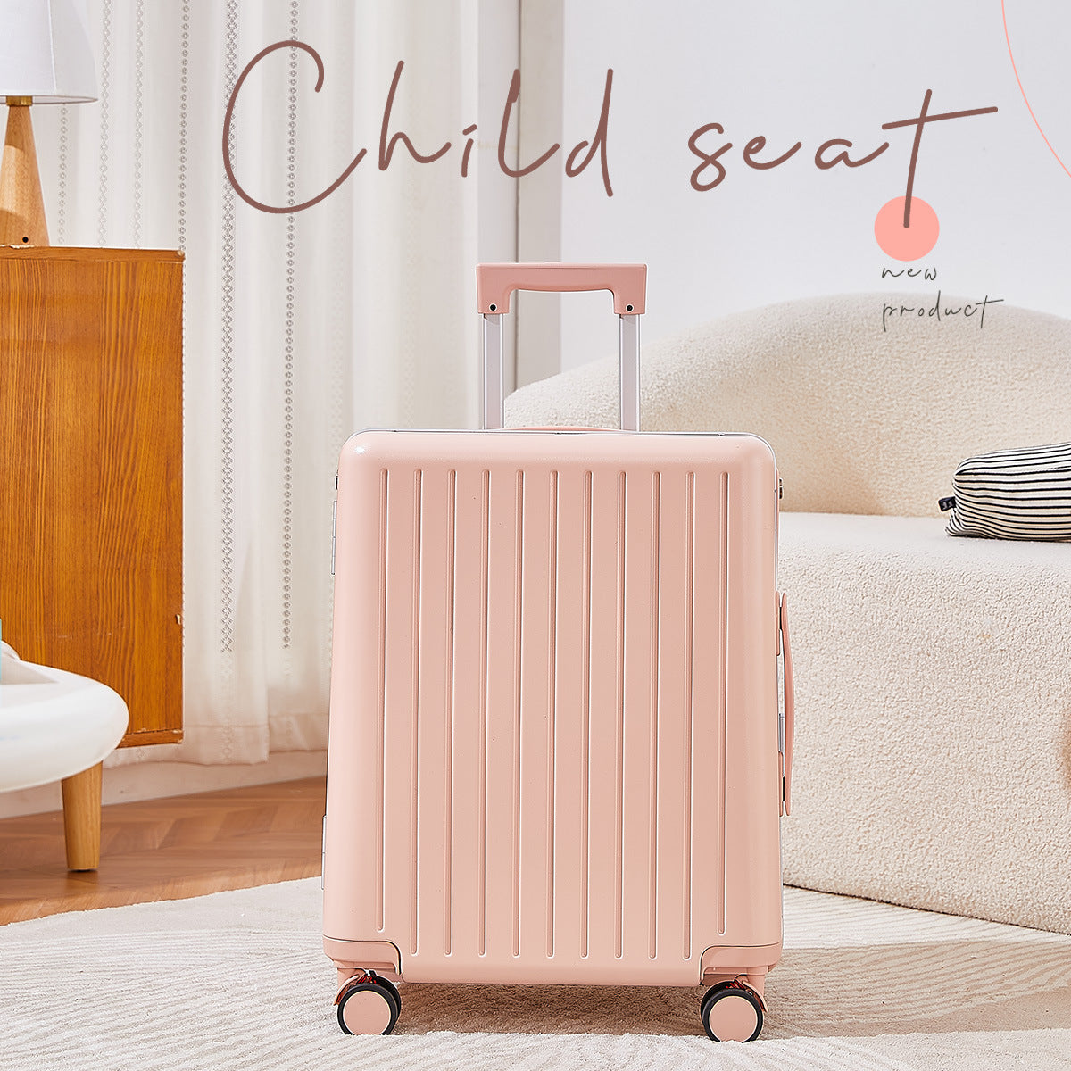 Pink suitcase on a carpeted floor with a neutral-colored sofa and wooden cabinet in the background.