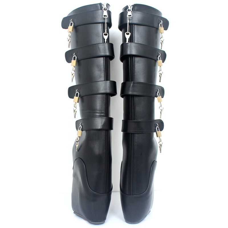 Pair of black boot covers with straps and chains on a white background