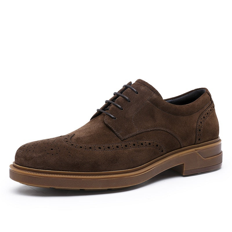 Brown suede dress shoe on a white background