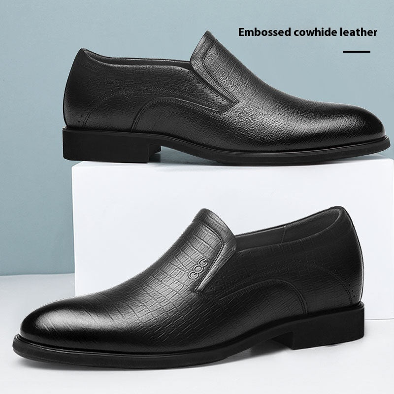 Black embossed leather shoes on a white and light blue background