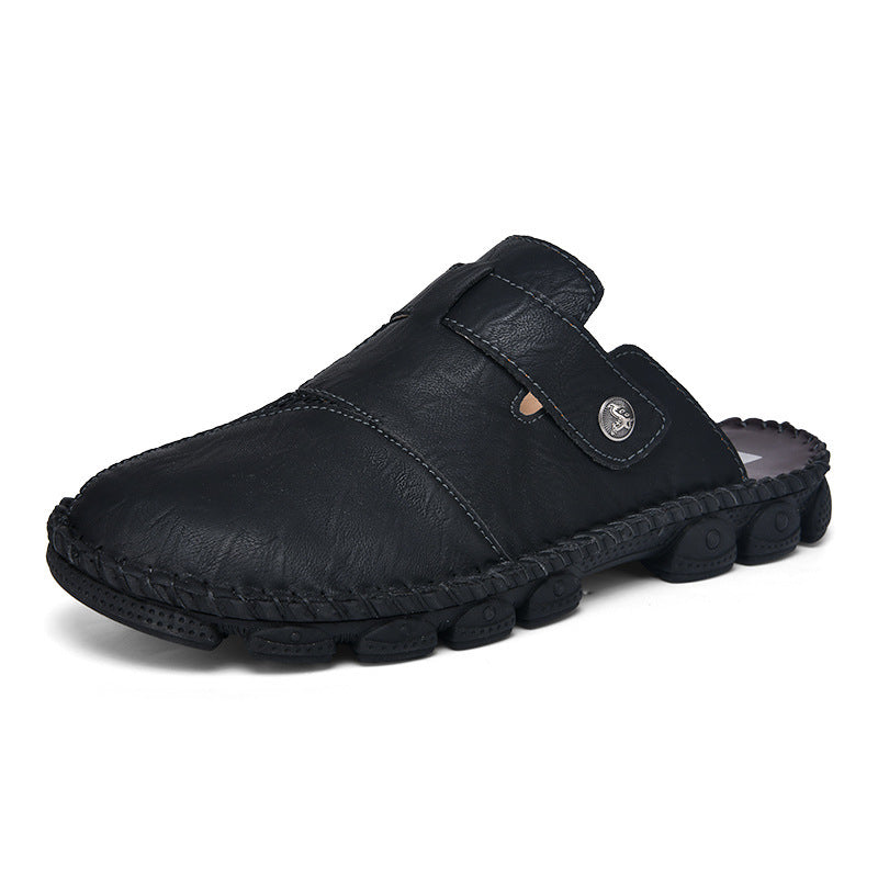 Black leather slip-on shoe on a white background