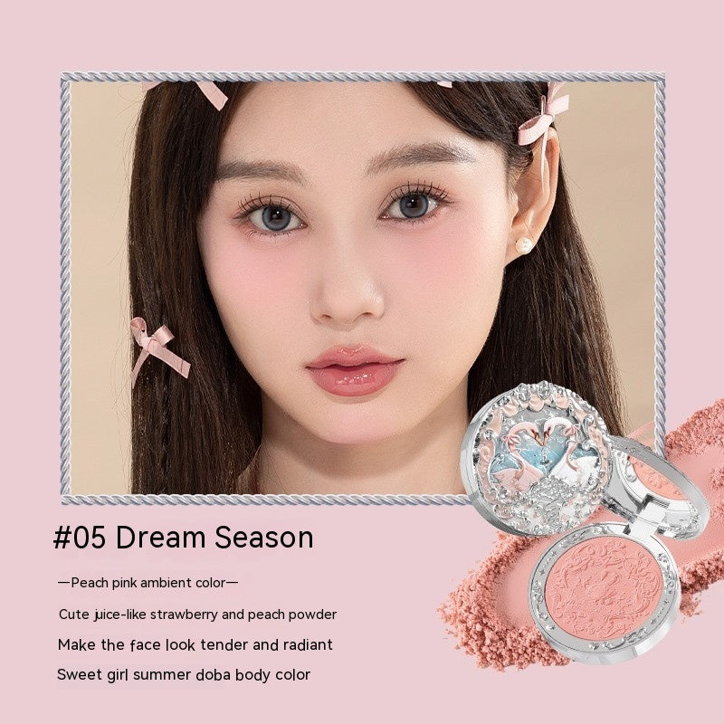 Makeup product with a model wearing pink hair clips on a beige background