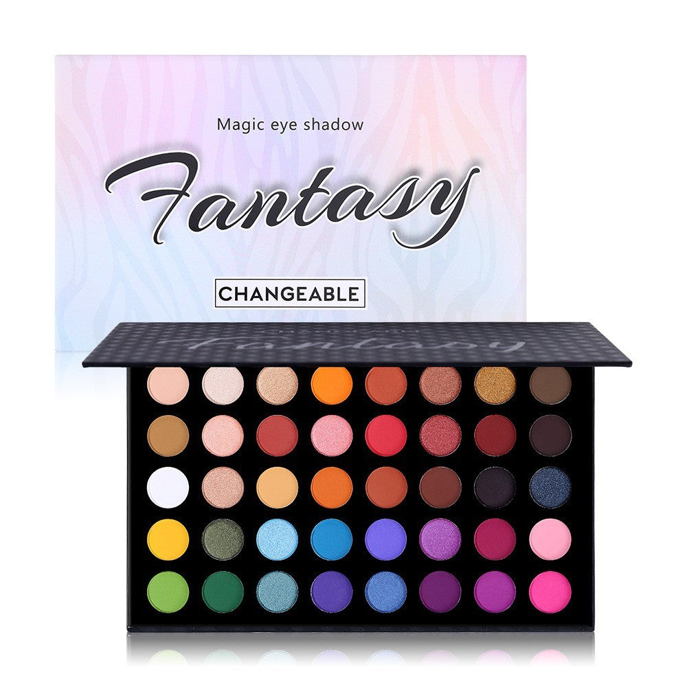 Eyeshadow palette with colorful shades and 'Fantasy' branding on a gradient background