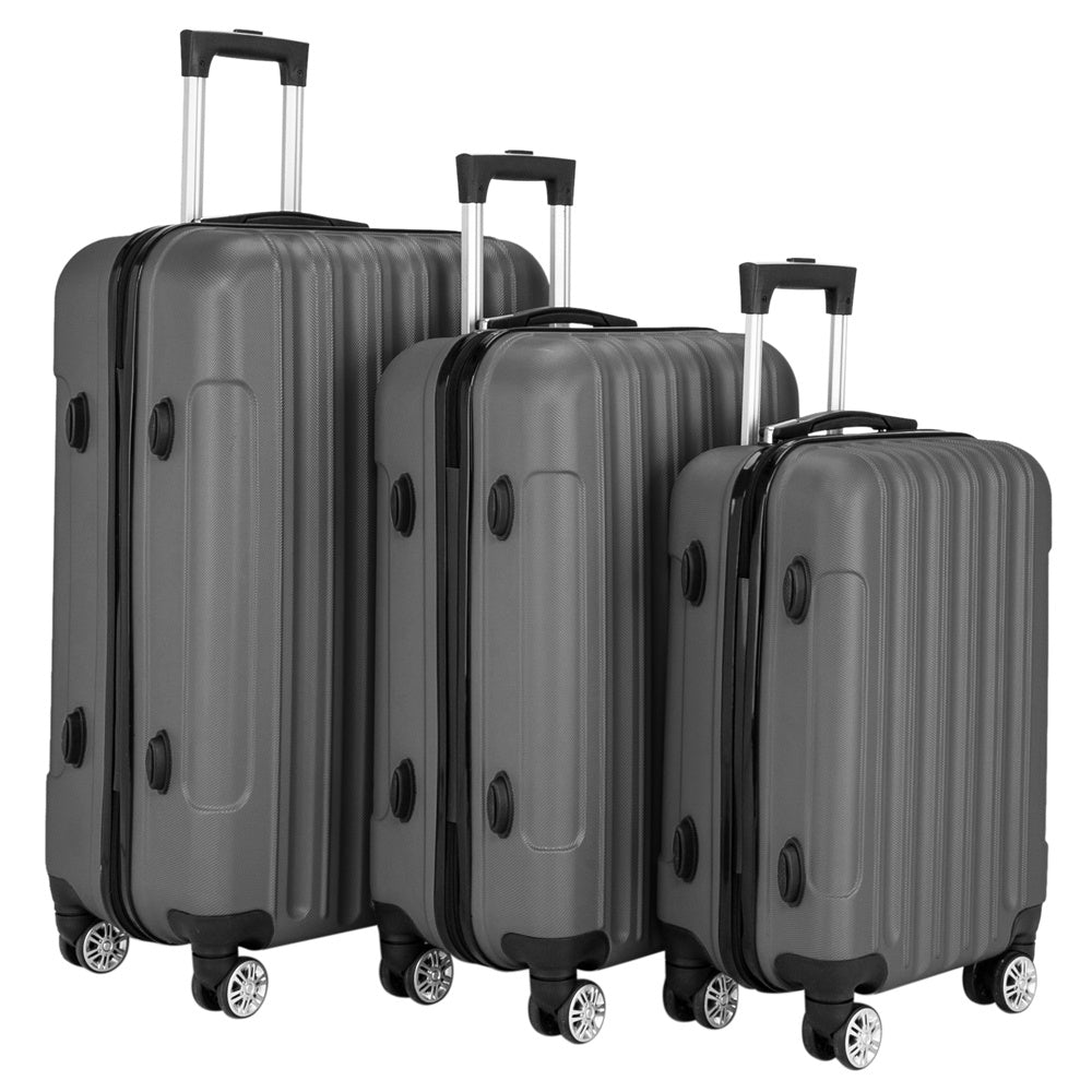 Set of three gray suitcases of different sizes on a white background