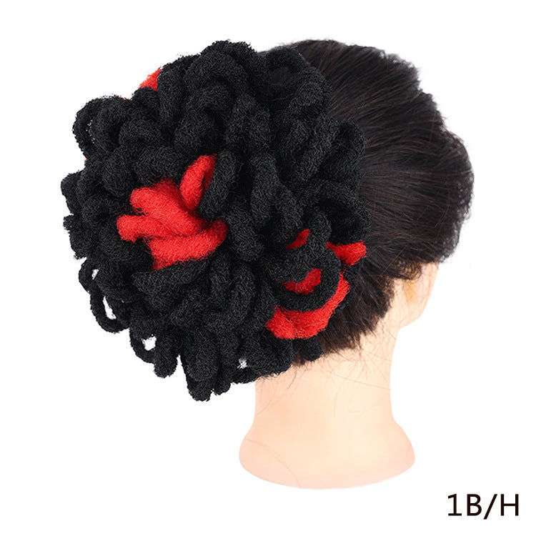 Black and red hair bun accessory on a mannequin head with '1B/H' label.