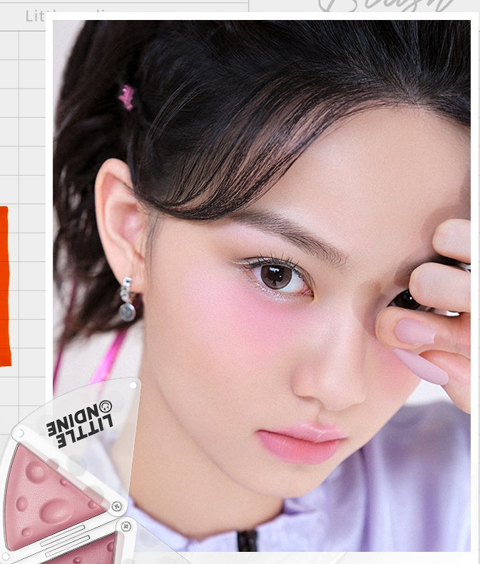 Close-up of a person applying makeup with a cosmetic product in the foreground