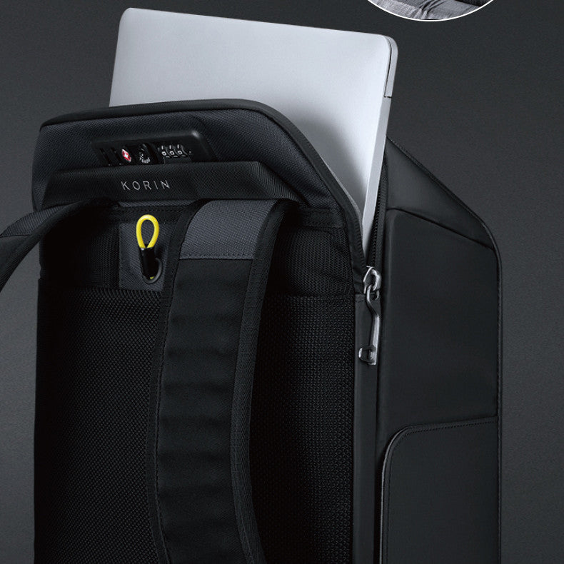 Black backpack with a laptop inside on a dark background