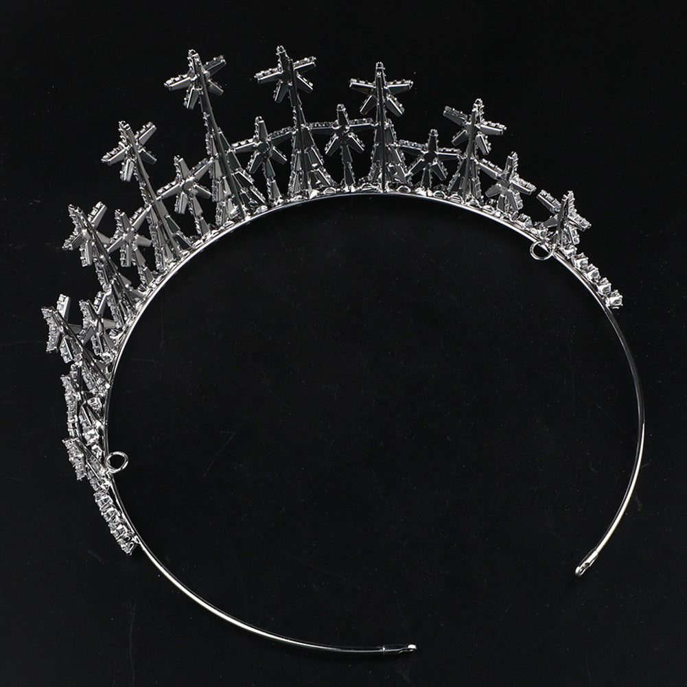 Silver tiara on a black background