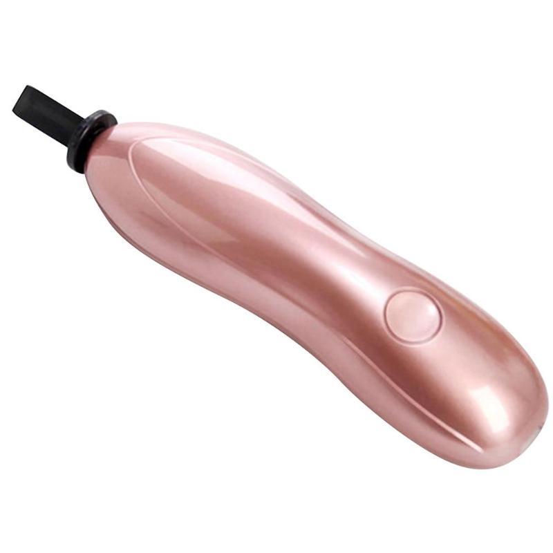 Rose gold electronic device with a black top on a white background